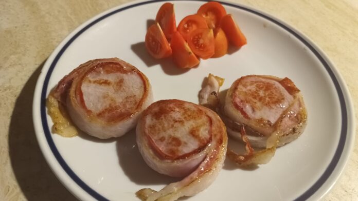 Filetti di maiale con lardo e speck cotti